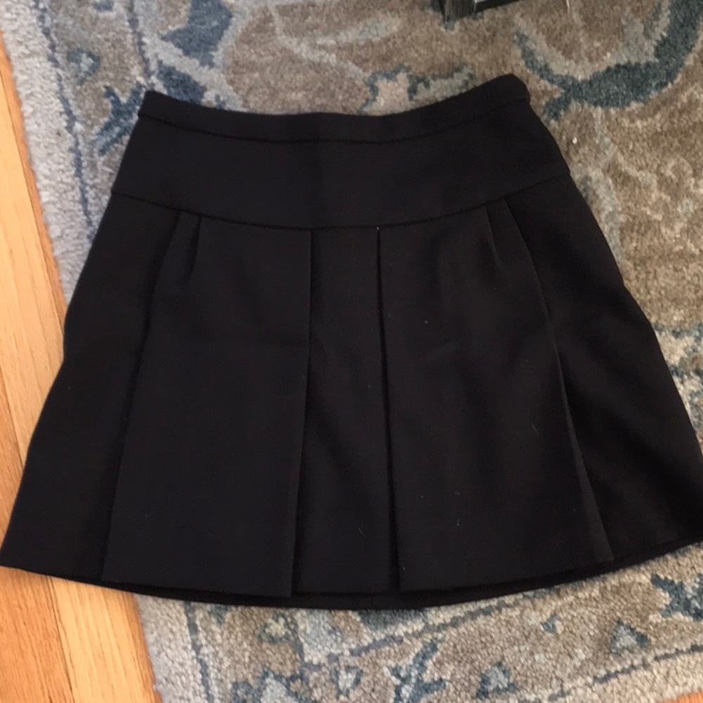 Black j crew mini skirt with pleats size 2
